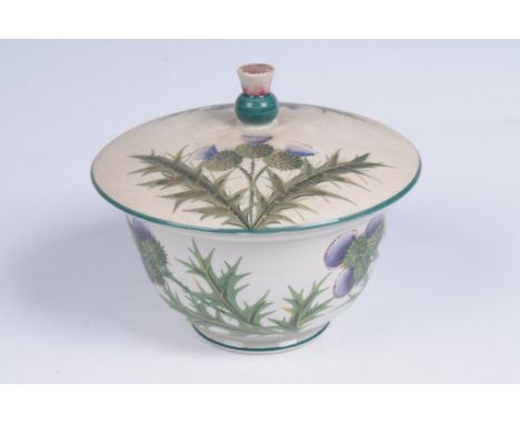 A Wemyss Ware 'thistles footed bowl and cover'
The slightly domed cover with a thistle finial each side decorated with thistl