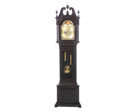 A five tube musical Westminster style longcase clock
The mahogany architectural case raised on bracket feet, the trunk with g