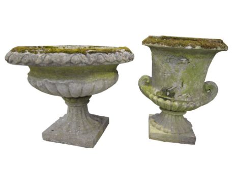 Two reconstituted stone garden planters
The first of classical design rising from a spreading square section base and termina