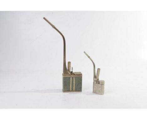 Two Chinese opium smoking pipes
The first of square section clad in faux shagreen outer casing, the hinged flap and various m