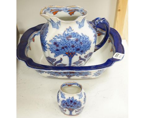 A Doulton Burslem "Tudor" pattern pottery toilet jug, basin a toothbrush vase, af (3)