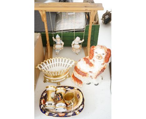 A pair of bisque swinging figures, Royal Worcester cabinet cup and saucer and five other items