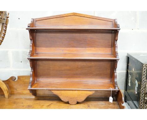 A late Victorian mahogany three tier wall shelf, width 86cm, height 86cm