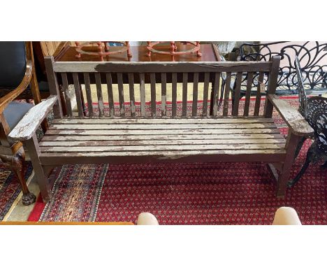 A part painted weathered teak garden bench, length 183cm, depth 56cm, height 80cm