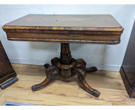 A good William IV rectangular rosewood folding card table, stamped with makers mark internally ‘T. Phillips, cabinet &amp; ch