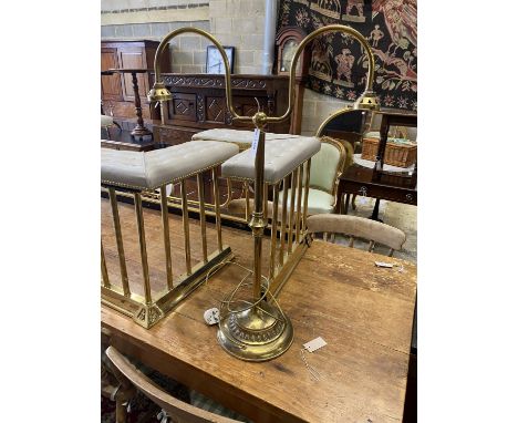 An early 20th century lacquered brass twin branch reading light with blue glass shades, height 86cm