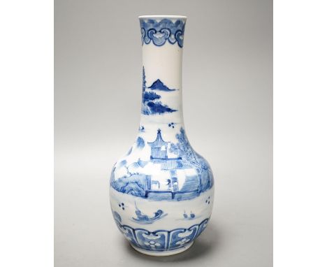 A Chinese blue and white bottle vase, Kangxi mark but 19th century. 25cm