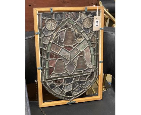 A Victorian stained glass panel decorated with three bells, width 30cm, height 45cm