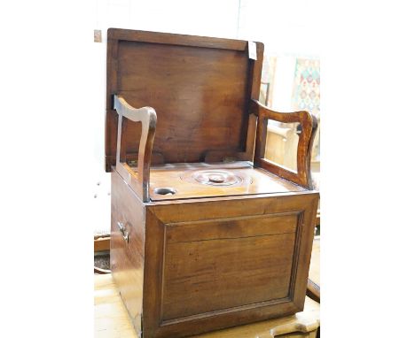 An early 19th century mahogany box commode with folding top and bone handled brass pump handle, width 57cm