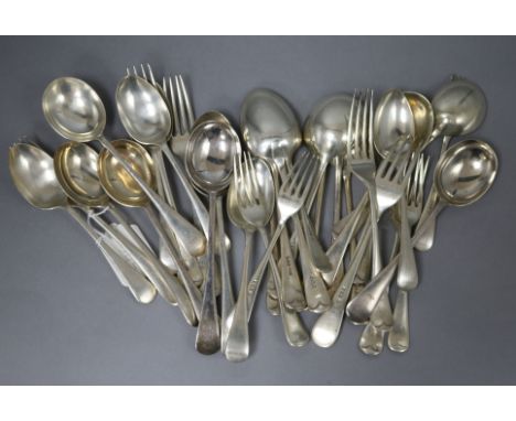 A mixed part canteen of 20th century Old English pattern flatware, various dates and makers, comprising: 5 table forks6 desse