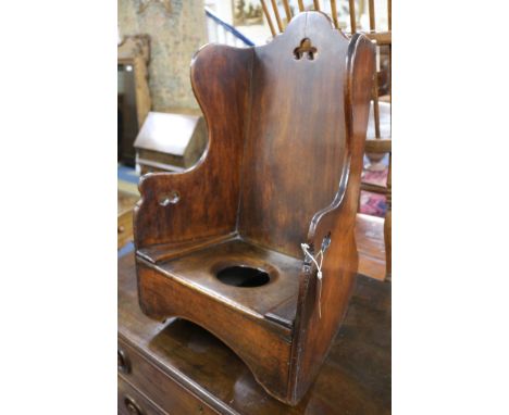 A child's rocking chair/commode W.42cm