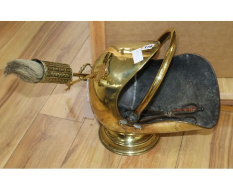 A brass coal scuttle and fire tools