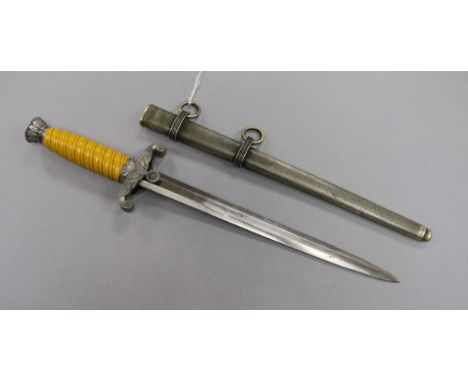 An Army Officers dagger with yellow grip, maker WKC