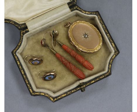 Two pair of antiques earrings including coral and enamel and a gem set locket.