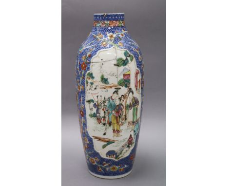 An 18th century Chinese export vase with panels of figures height 29cm