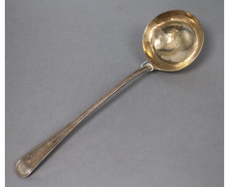 A Victorian silver Old English beaded pattern soup ladle by George Adams, London, 1871, 34cm, 8.5 oz.