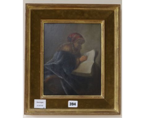 19th century Continental Schooloil on wooden panelAn old woman reading a book26 x 21cm