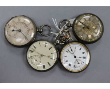 Four assorted pocket watches including three engine turned silver pocket watches.