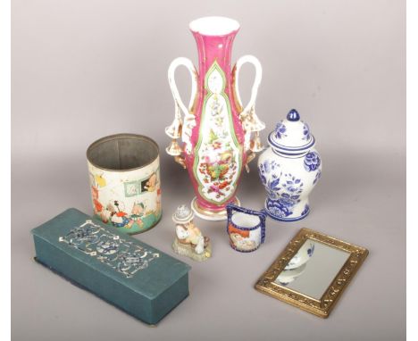 A mixed group lot to include Hummel figure, ornate ceramic vase, small brass framed mirror etc.  