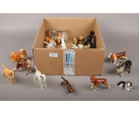 A collection of ceramic dog figure's Beswick, foreign examples  