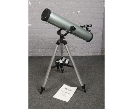A Vivitar telescope model 70076 on stand, with lenses and instruction manual.  