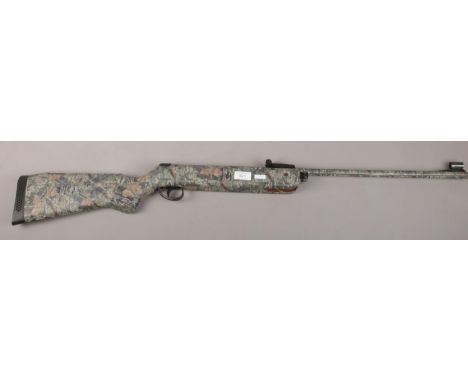 A 177 BSA Air Rifle 0.22 Calibre with army camouflage covering. SORRY WE CAN NOT PACK AND SEND  