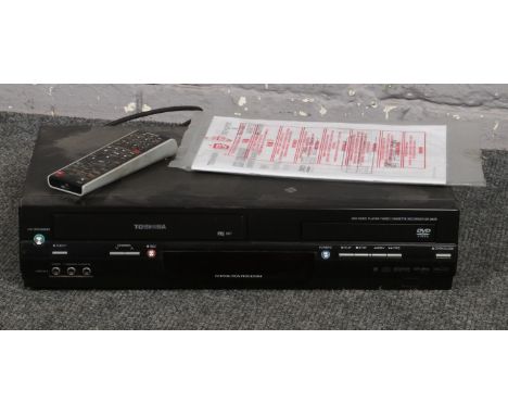 Toshiba DVD Video player/ video cassette recorder with remote control and instruction manual  