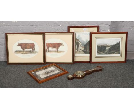A collection of prints, along with a modern barometer.  