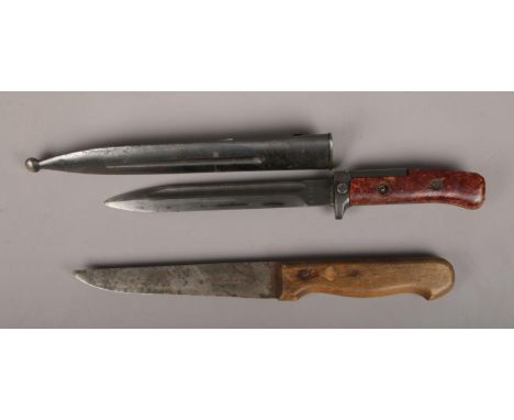 A German Friedrich Herder hunting knife, along with a World War Two bayonet in metal scabbard, marked X 0428 to blade.  