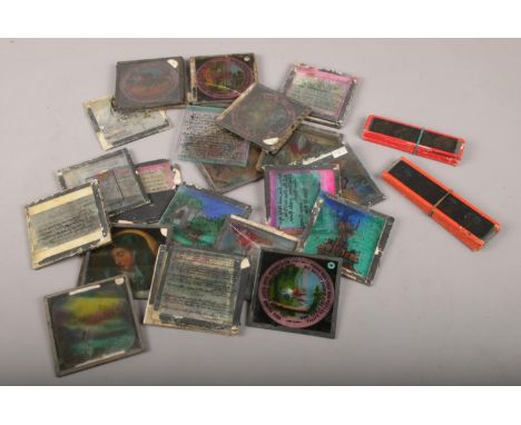 A collection of glass magic lantern slides and strip slides, to include nursery rhyme and biblical examples etc.  Some with c