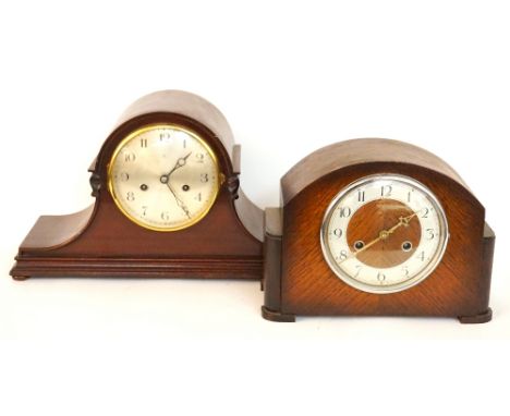 'HAMBURG AMERICAN CLOCK Co.' MANTLE CLOCK
with an eight day movement and silvered circular dial in a shaped mahogany case, to