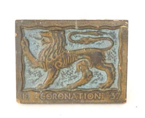 MARSDEN 'CORONATION 1937' TERRACOTTA TILE
to commemorate the coronation of George VI, decorated with a lion in relief and ins