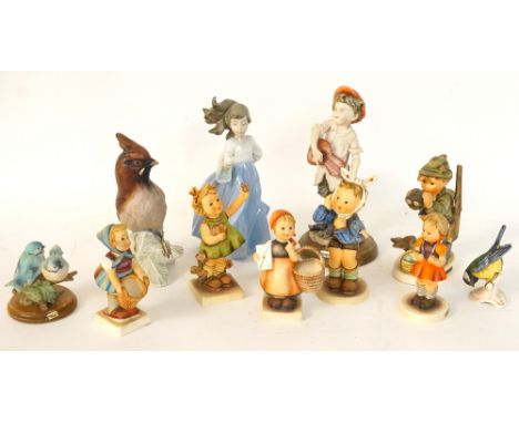LLADRO PORCELAIN FIGURE
of a young girl with a dove in her right hand, 18.5cm high, a Goebel woodpecker and blue tit together