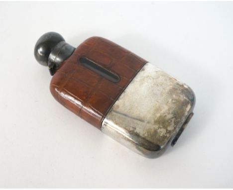 WALKER & HALL 1/5 PINT HIP FLASK
early 20th century, with partial crocodile skin covering, 14.9cm high