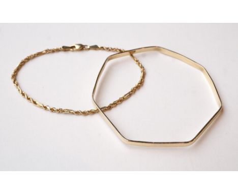 NINE CARAT GOLD HEPTAGONAL BANGLE
and a nine carat gold rope twist chain bracelet, total weight approximately 8.7 grams