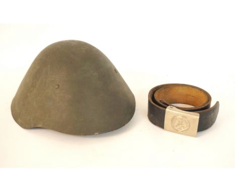 EAST GERMAN ARMY PARADE HELMET
circa 1980, the toughened plastic shell with named liner and chinstrap, size 57, together with