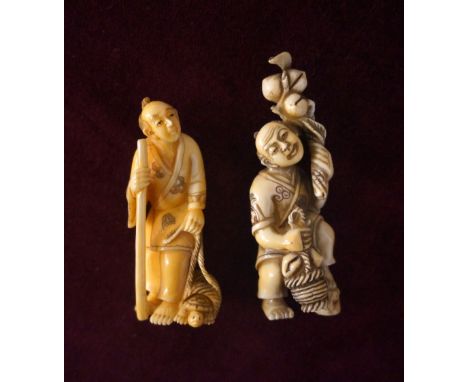 JAPANESE CARVED IVORY NETSUKE
of a man holding a staff, with a turtle in a basket beside him, 6cm high; and an ivory netsuke 