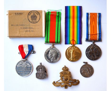 1914-18 BRITISH WAR AND VICTORY MEDALS
named to '145334 Gnr.J.Connell. R.A.', with Royal Artillery cap badge, football medal 