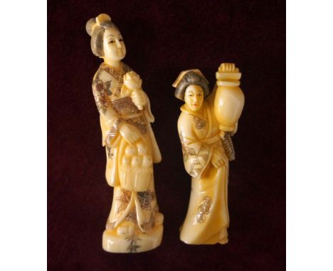 JAPANESE CARVED IVORY NETSUKE
of a geisha carrying a flower and a basket of fruit, 8.6cm high; and an ivory netsuke of a geis