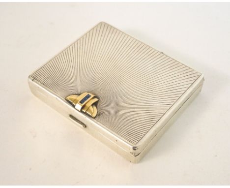 TIFFANY & CO SILVER TRINKET BOX
with engine turned decoration, the lift up lid with a gold and sapphire raised mount, the int