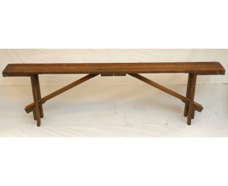 VINTAGE PINE BENCH
with a slatted three plank top, standing on folding supports, 183cm wide 