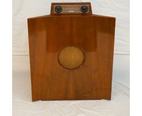 1950's 'MURPHY 146' RADIOGRAM
with a walnut case having an angled plastic front waveband, flanked by a volume and tuning dial