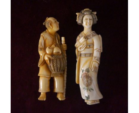 JAPANESE CARVED IVORY NETSUKE
of a man holding a staff with a basket of fruit, 6.9cm high; and an ivory netsuke of a Geisha h
