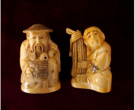 CARVED BONE NETSUKE
of a man with a basket of fish, 5.4cm high; and a carved bone netsuke of a man offering vegetables, 5cm h
