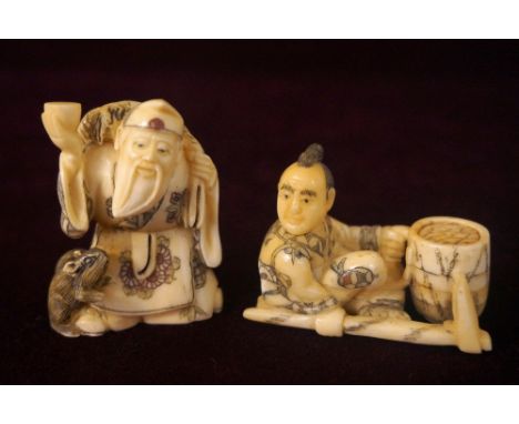 JAPANESE CARVED IVORY NETSUKE
of a farmer seated with his tools, 4cm high; and a bone netsuke of an old man holding a cup wit