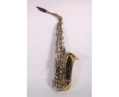 King 613 Alto Saxophone, with mouthpiece and strap, in original carry case.