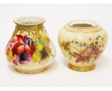 Two Royal Worcester vases, one with decoration signed 'K Blake', height 11cm. Condition - both missing lids, otherwise very g