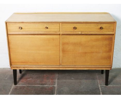 A Gordon Russell light oak sideboard. L137cm