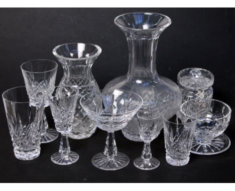 A suite of Waterford crystal glasses, forty five pieces comprising a decanter, a water jug, eight large wine glasses, six mar