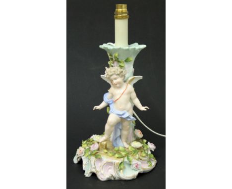 A continental porcelain lamp base, height 35cm. Condition - minor chips to petals only, no significant damage.